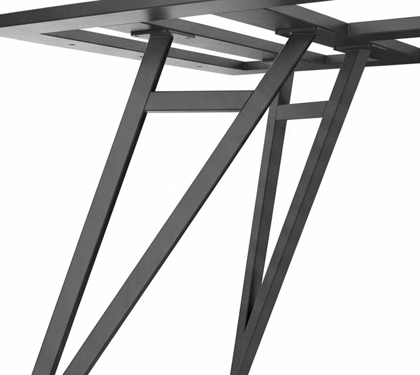 Close-up of black metal table legs with angled supports forming a triangular, architectural frame.