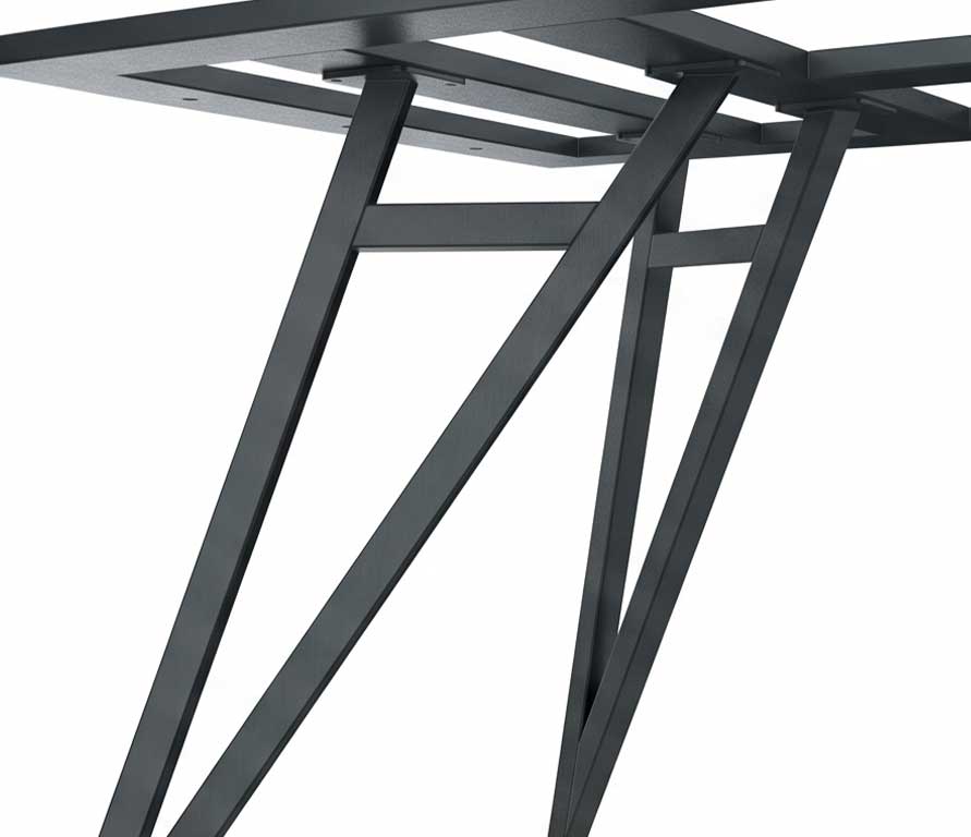 Dark metal table base with angled, crisscross legs and crossbars seen in close-up.