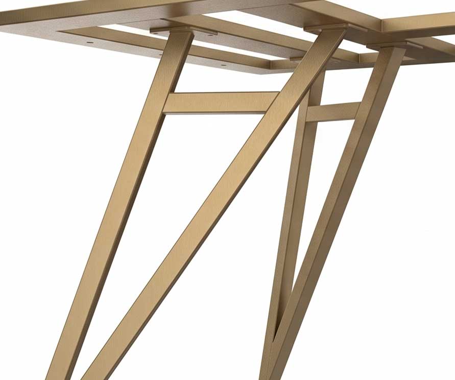 Close-up of angled wooden table legs and cross braces supporting a tabletop.