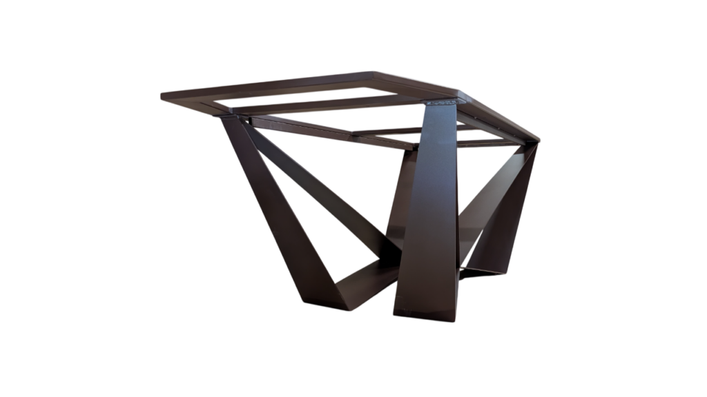 Angular black metal coffee table with geometric legs and a flat top against a black background.